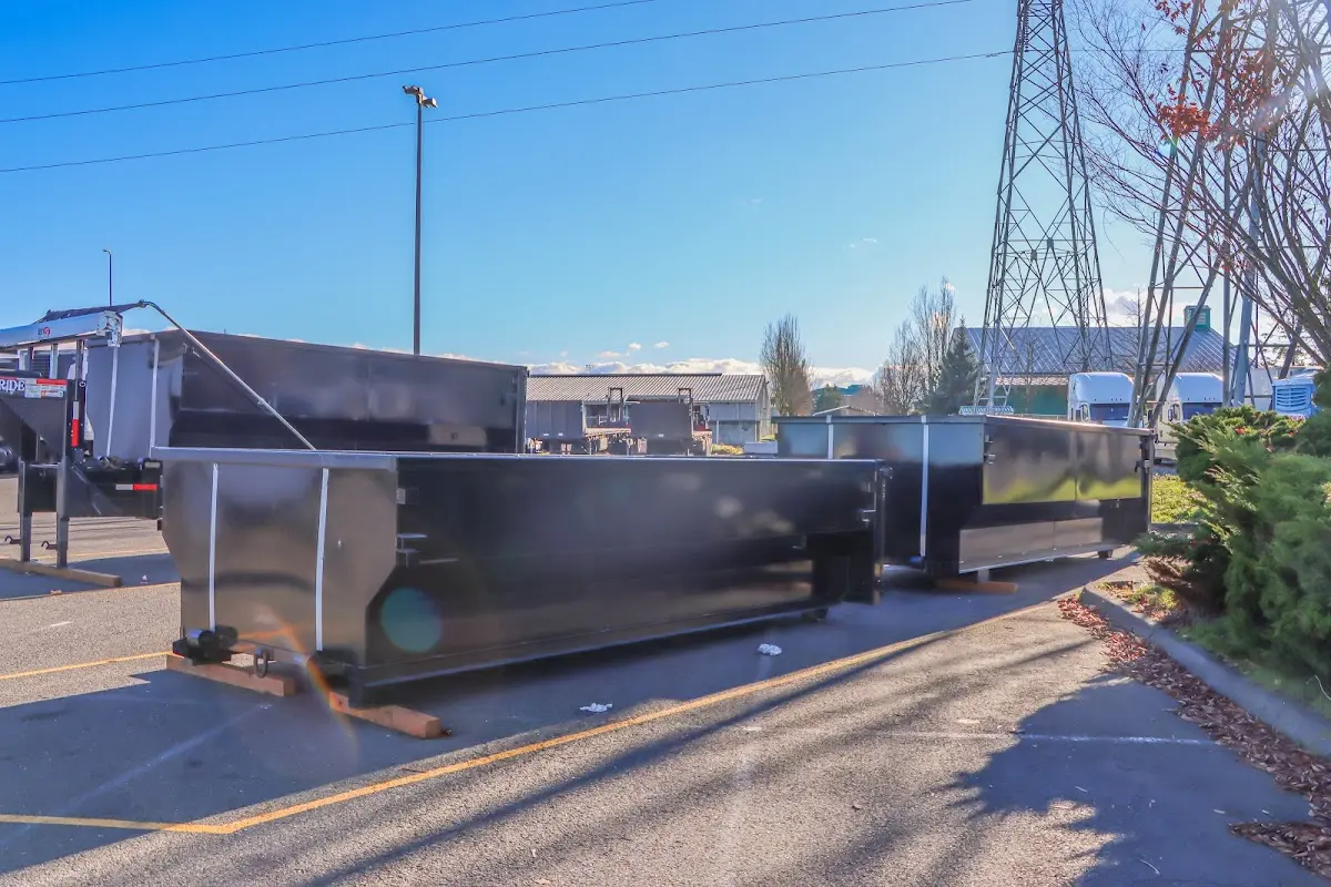 Roll-off dumpster ready for waste disposal at job site for 12 Yard Dumpster Rental in Hampton